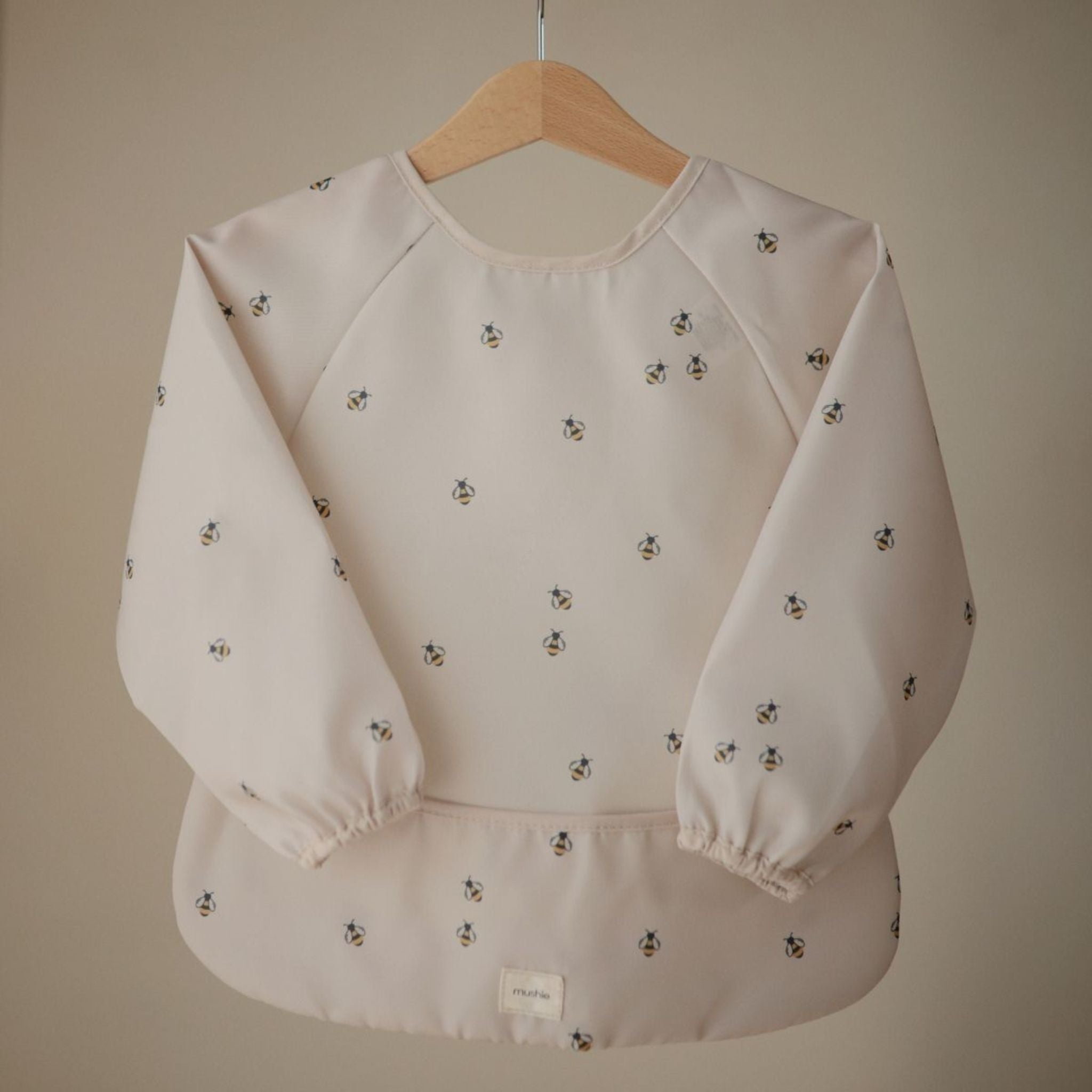 Bavoir manches longues imperméable Mushie Abeilles