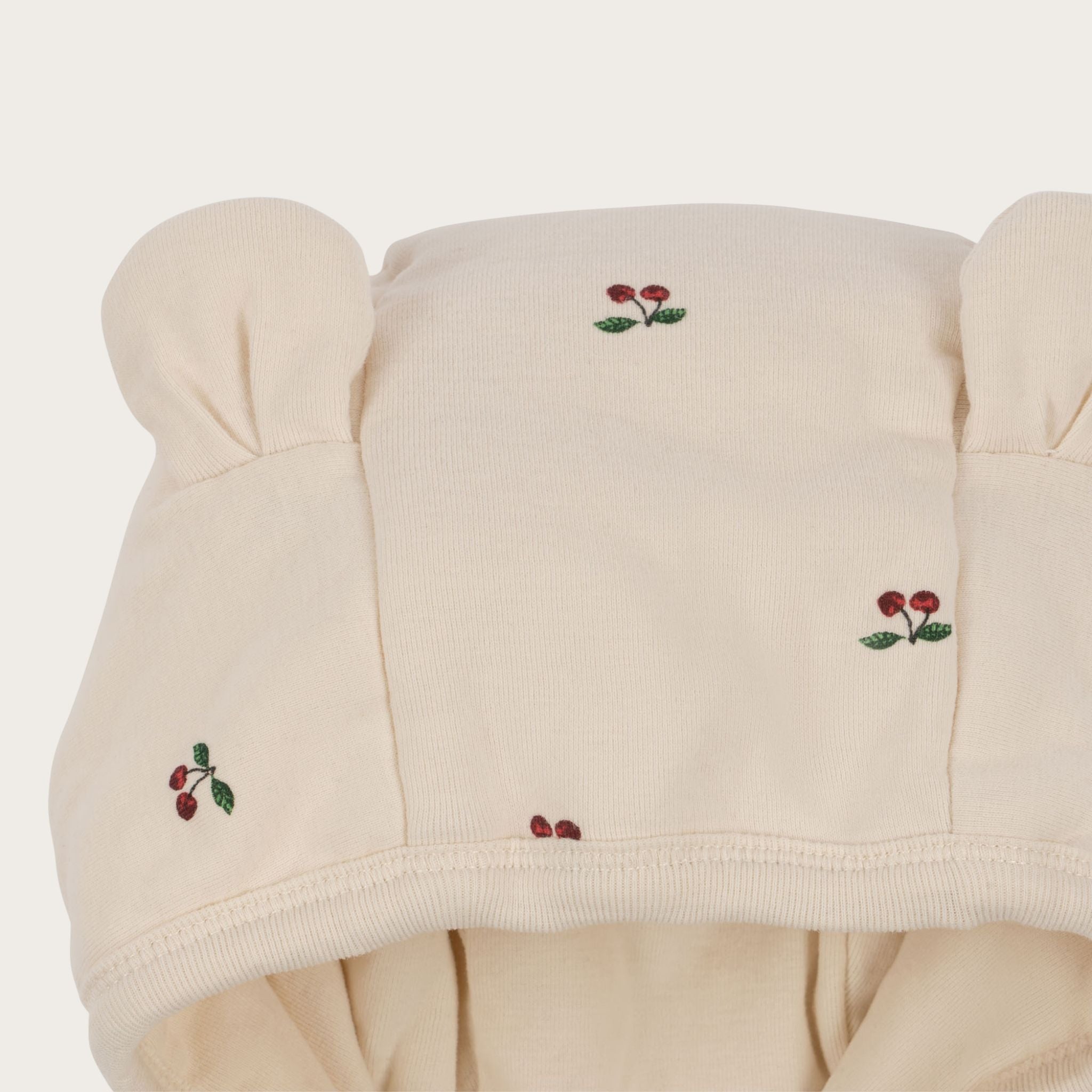 Grenouillère bébé en coton bio à capuche