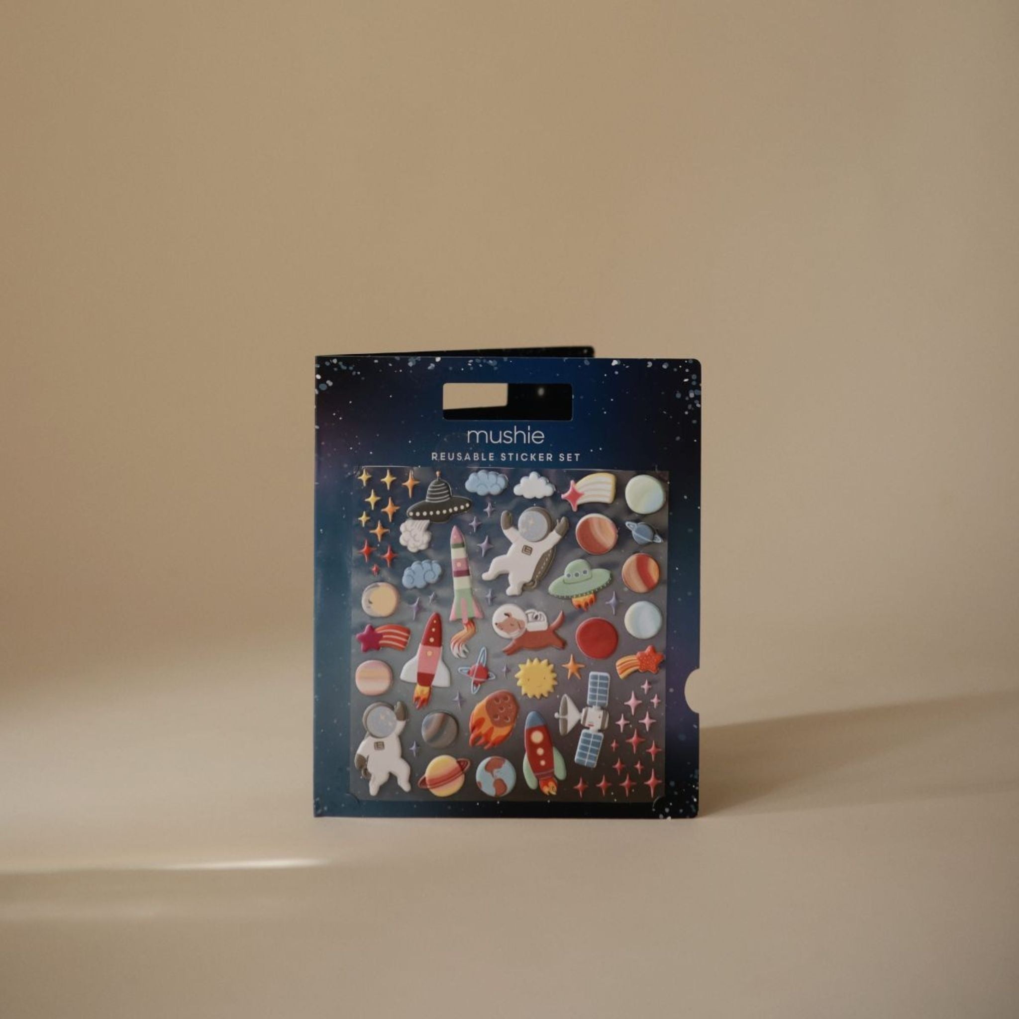 Livre d’autocollants réutilisables Mushie Espace