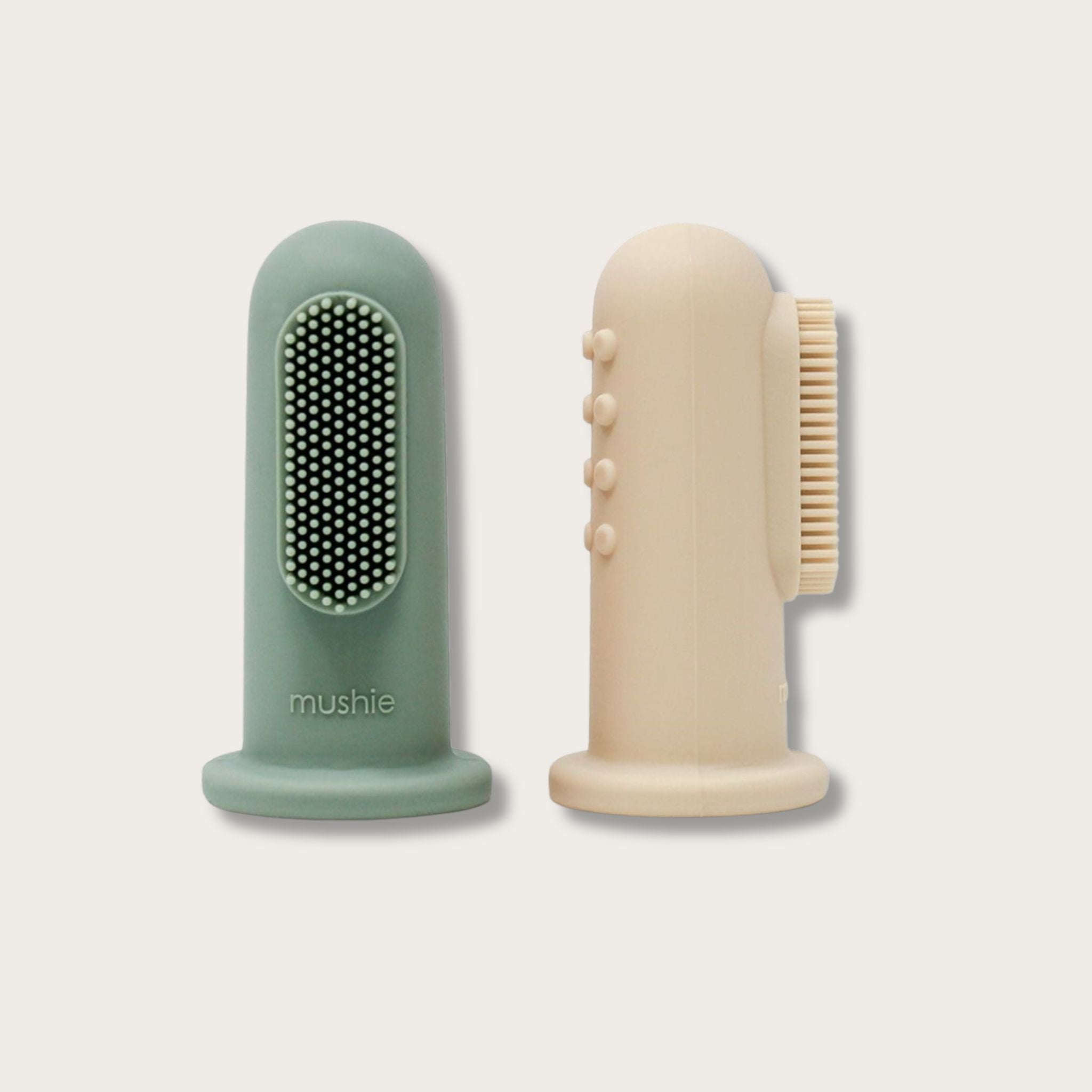 Brosse à dents à doigt Mushie en silicone alimentaire