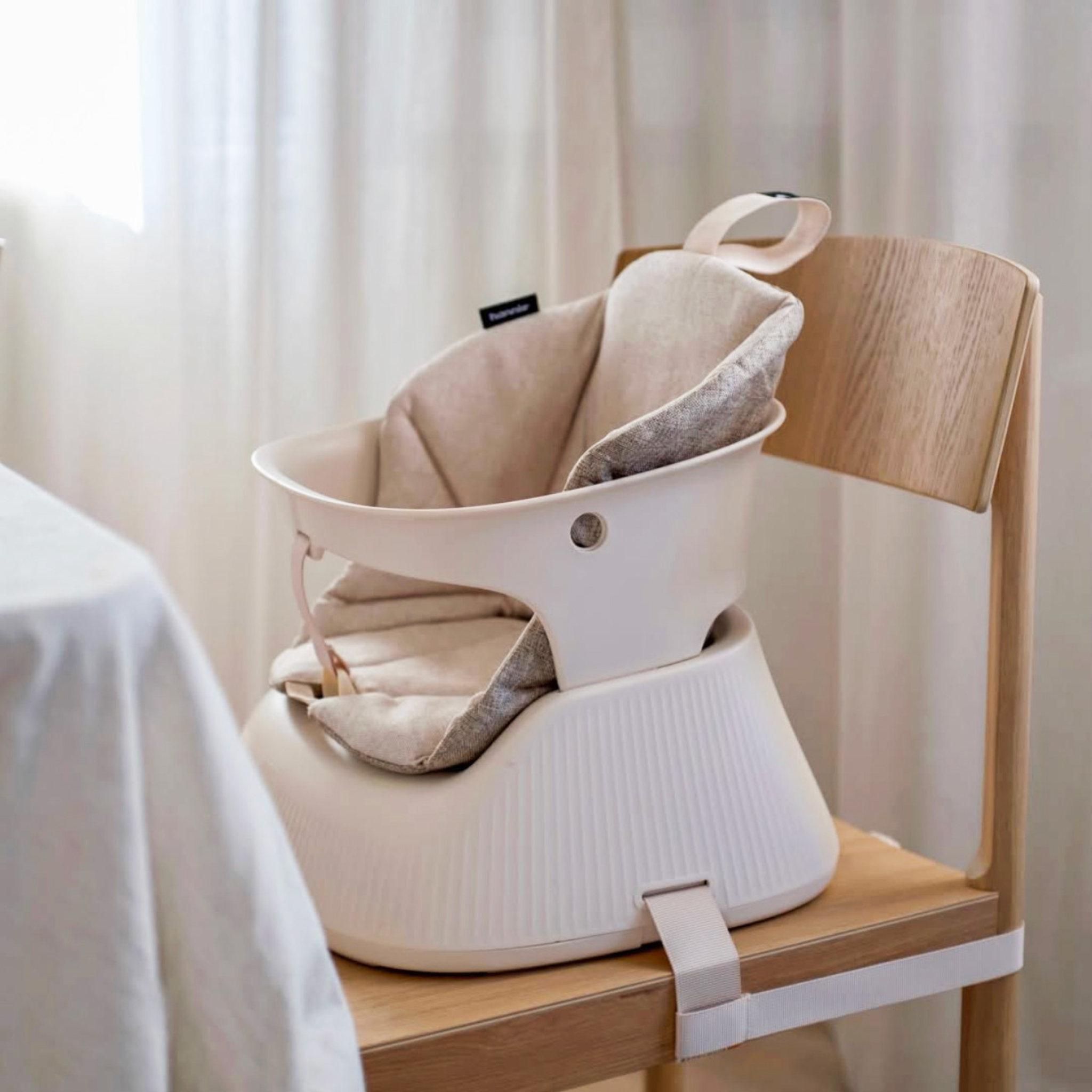 Chaise haute - réhausseur portable Hannie