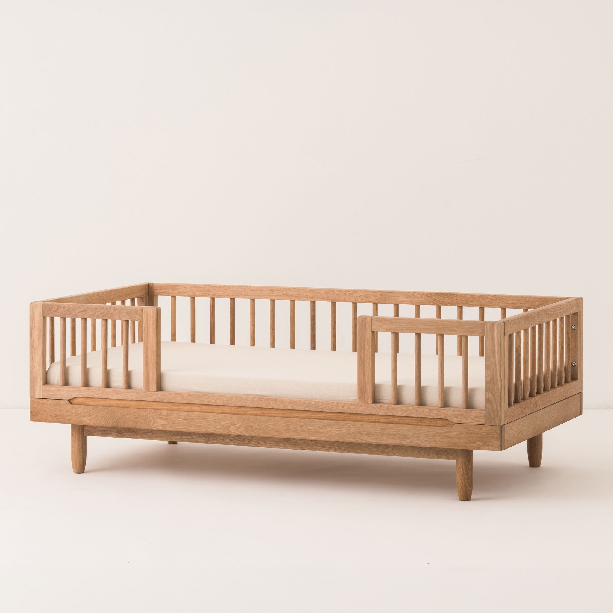 Lit évolutif bébé 140x70 en chêne massif Pure