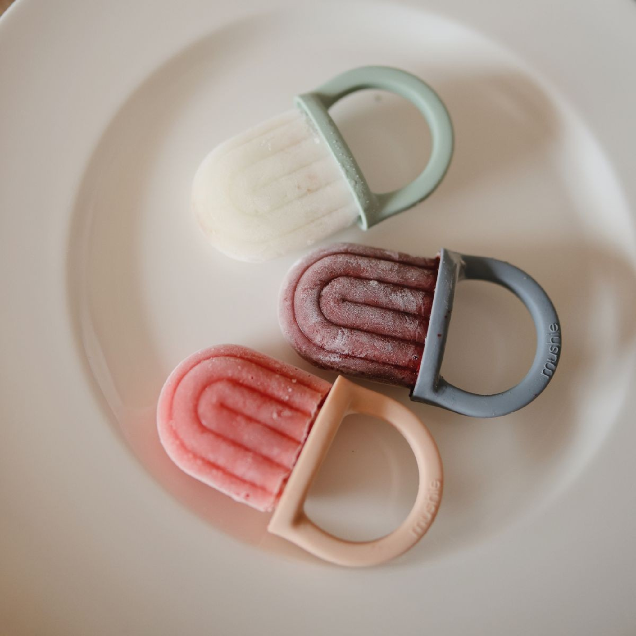 Moule à sucettes glacées Mushie - Blush